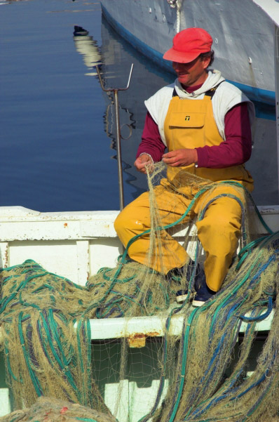 Mending nets in Marseille.